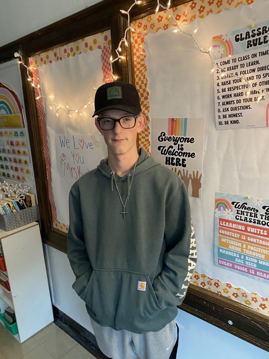 Brendon Green shows off his hat during Mrs. Kurtz's 3rd hour class